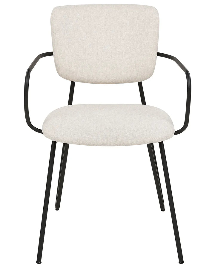 Cream upholstered dining chair with slim black metal legs and integrated armrests.