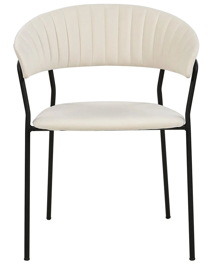 Cream upholstered dining chair with curved backrest and black metal frame.