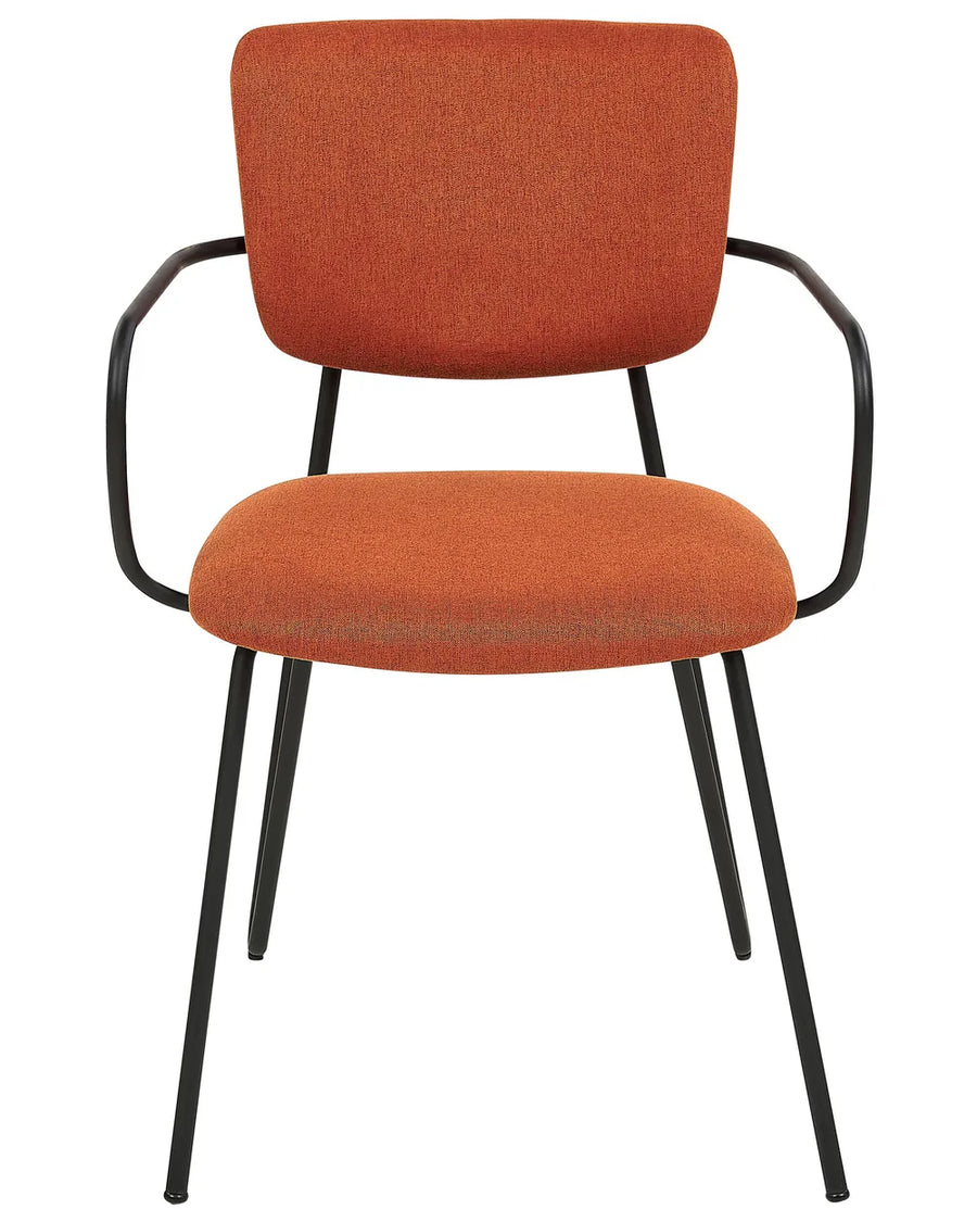 Rust orange upholstered dining chair with black metal frame and integrated armrests.