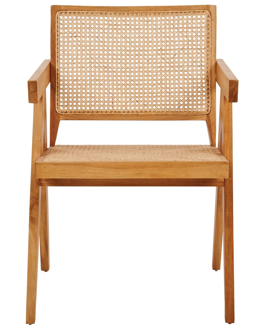 Wooden chair with wicker backrest on a white background.