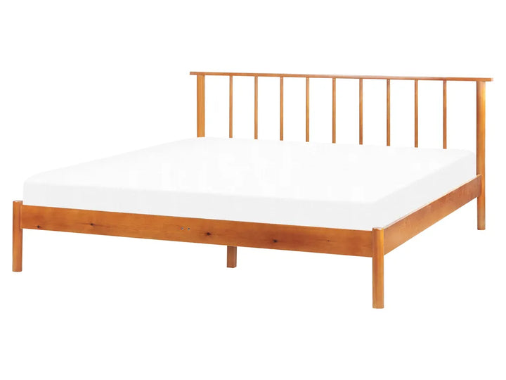 Natural ash wooden bed frame with headboard and white mattress on a white background