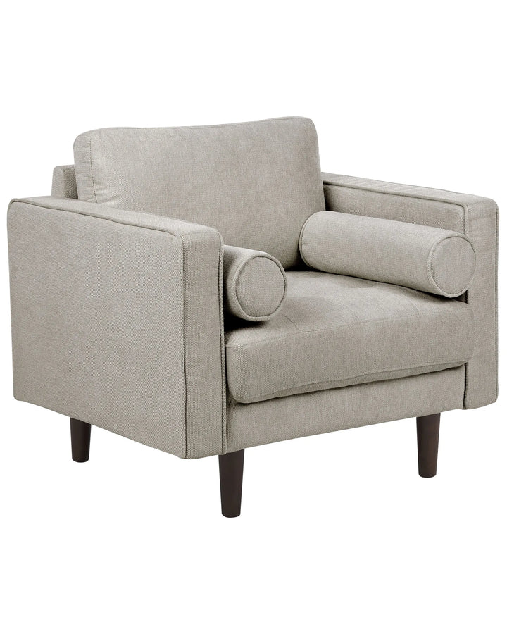 Beige armchair with wooden legs on a white background