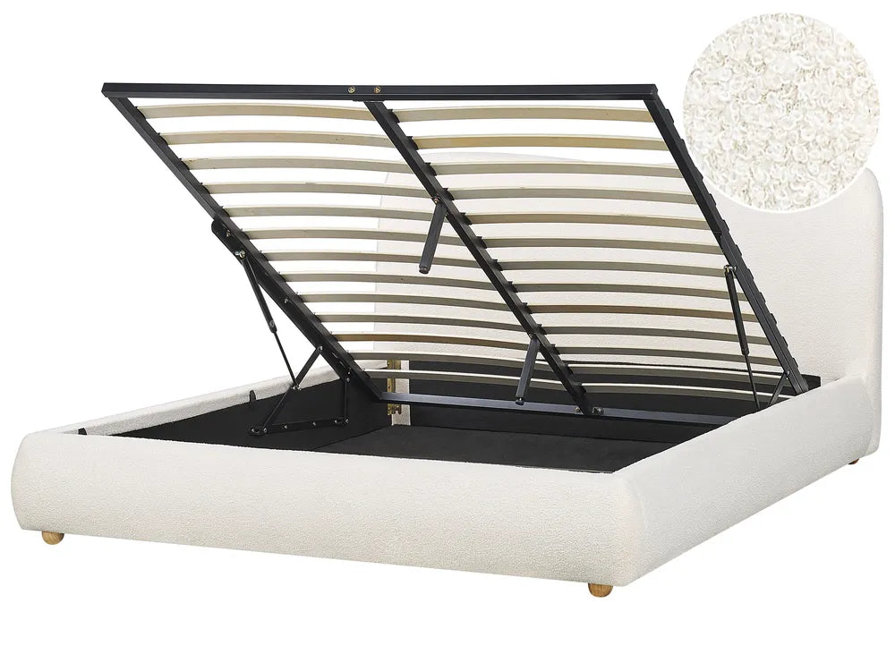White bed frame with black metal slats on a white background