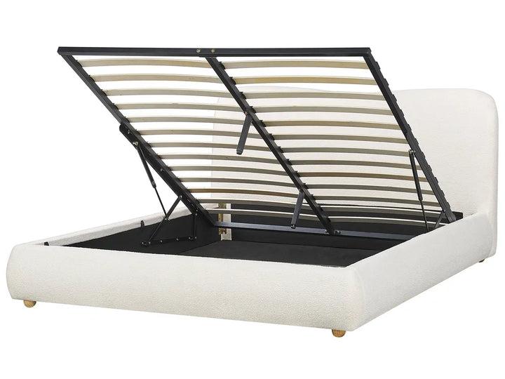 White bed frame with black metal slat support on a white background