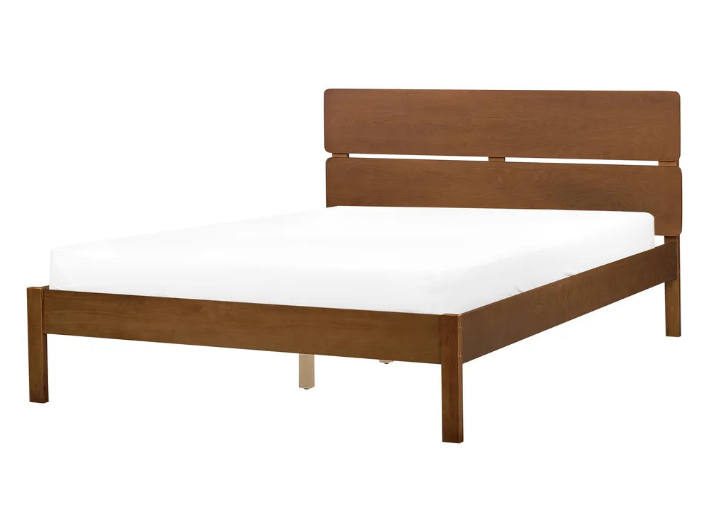Wooden bed frame with white mattress on a white background