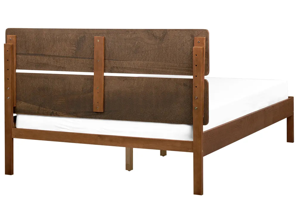 Wooden bed frame with brown headboard on a white background