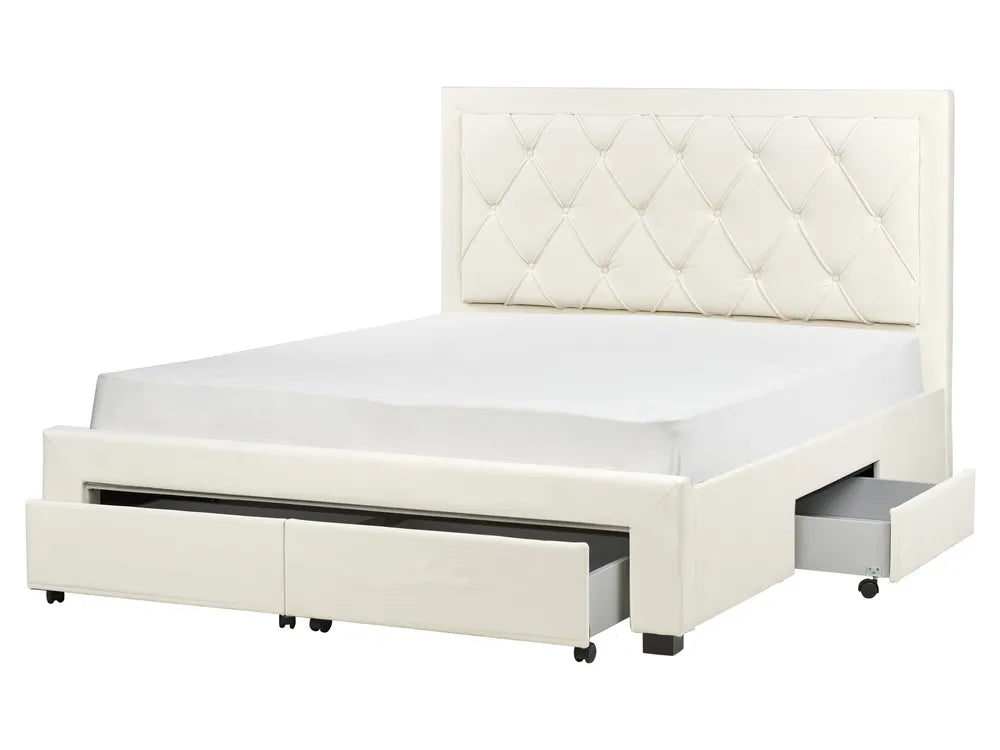 White bed with quilted headboard and storage drawers 