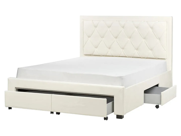 White bed with quilted headboard and storage drawers 