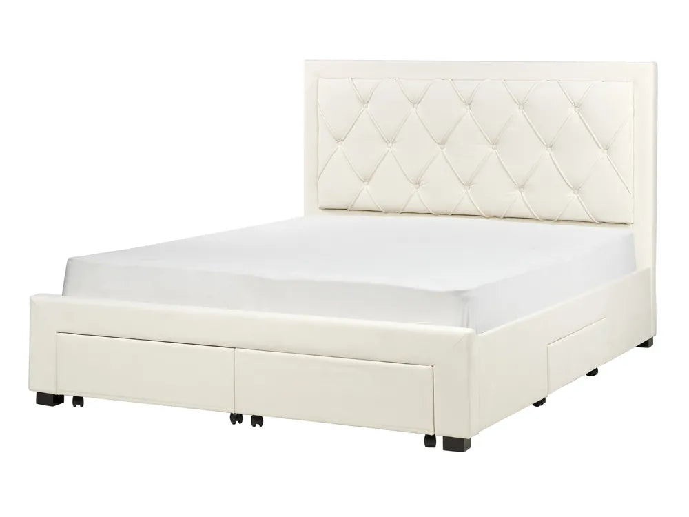 White upholstered bed with diamond patterned headboard 