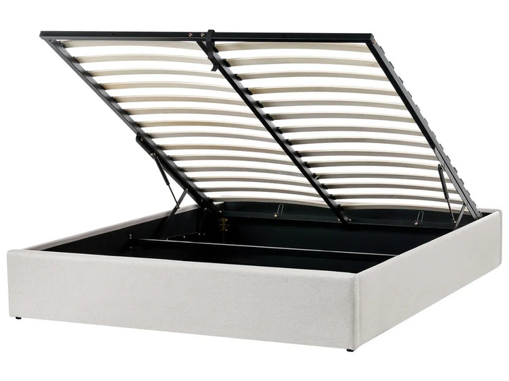 White bed frame with black metal slatted headboard on a white background