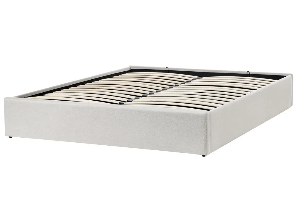 White bed frame with metal slats on a white background