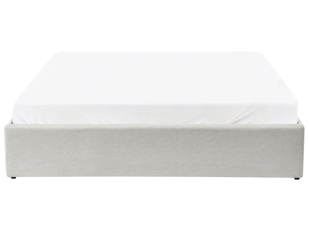 White bed frame with mattress on a white background