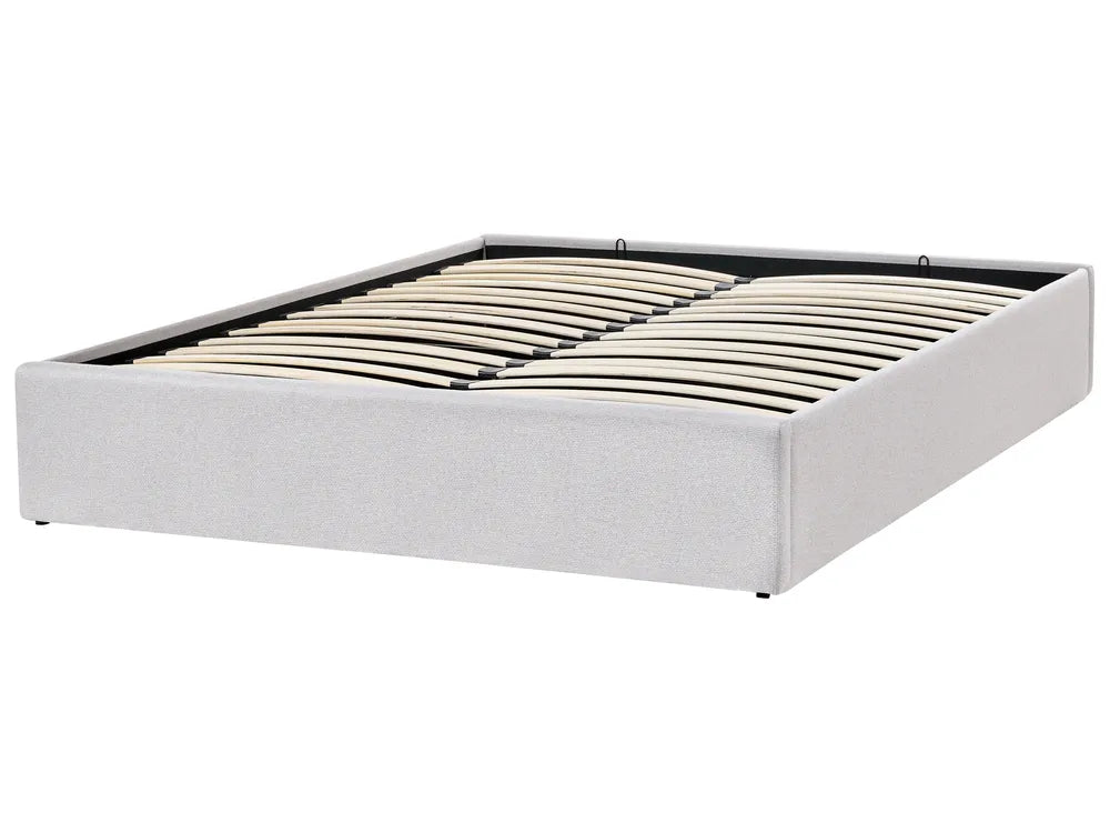White upholstered bed frame with wooden slats 