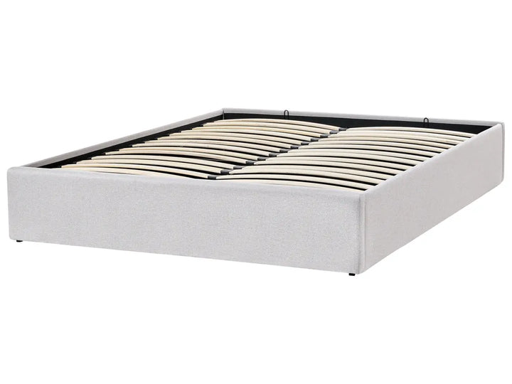 White upholstered bed frame with wooden slats 
