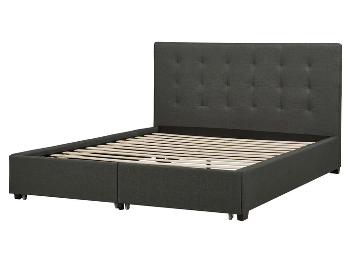 Black upholstered bed with tufted headboard
