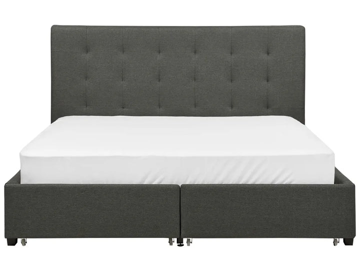 Grey upholstered bed with tufted headboard 