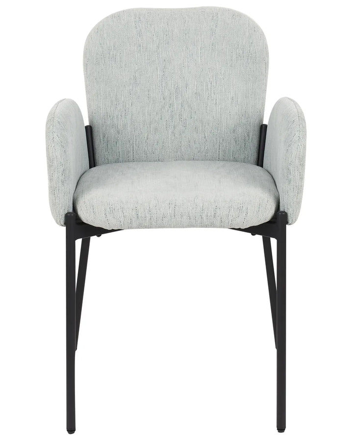 Light grey upholstered dining chair with rounded armrests, a cushioned seat, and slim black metal legs, offering comfort with a clean modern design.