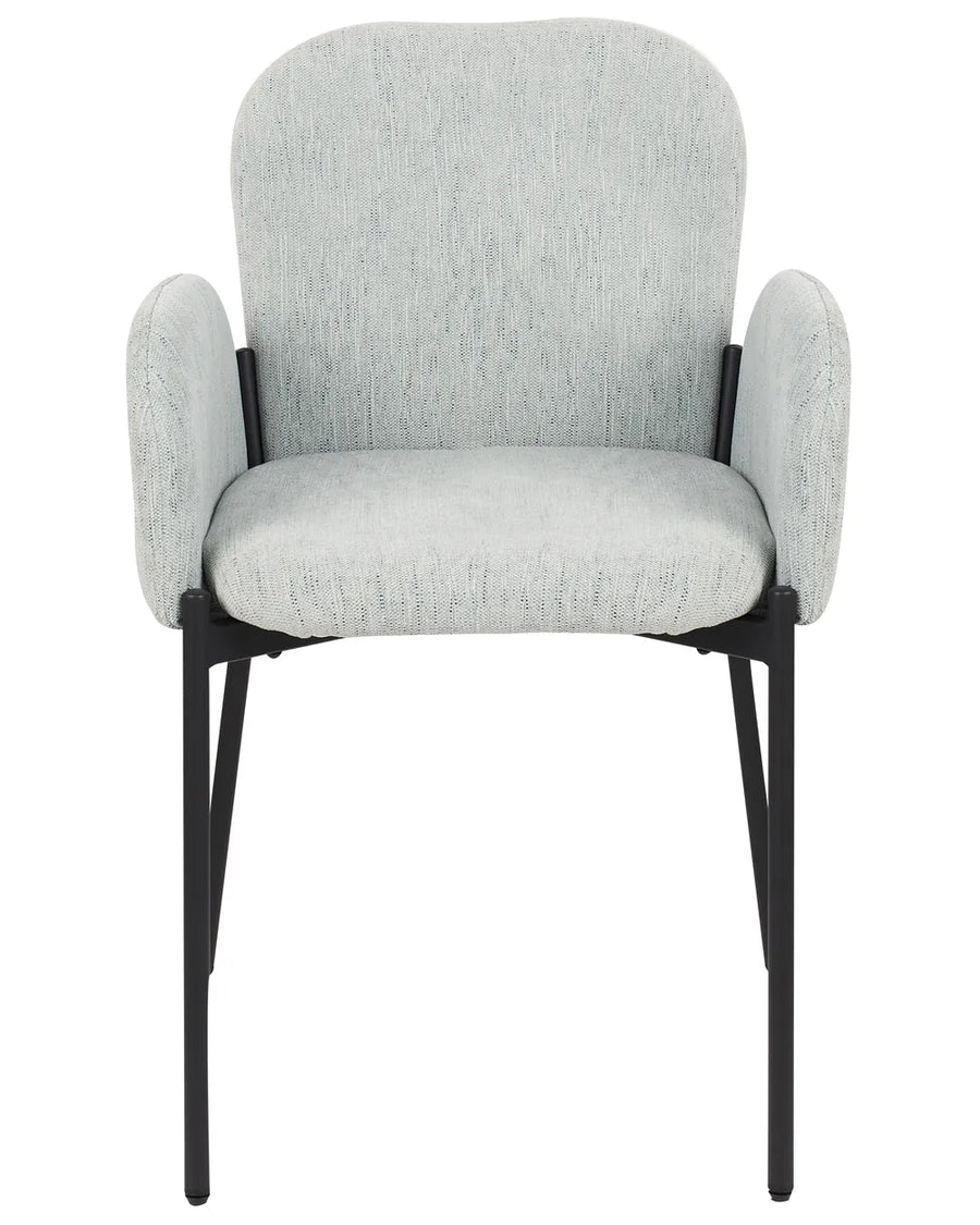 Light grey upholstered dining chair with rounded armrests, a cushioned seat, and slim black metal legs, offering comfort with a clean modern design.