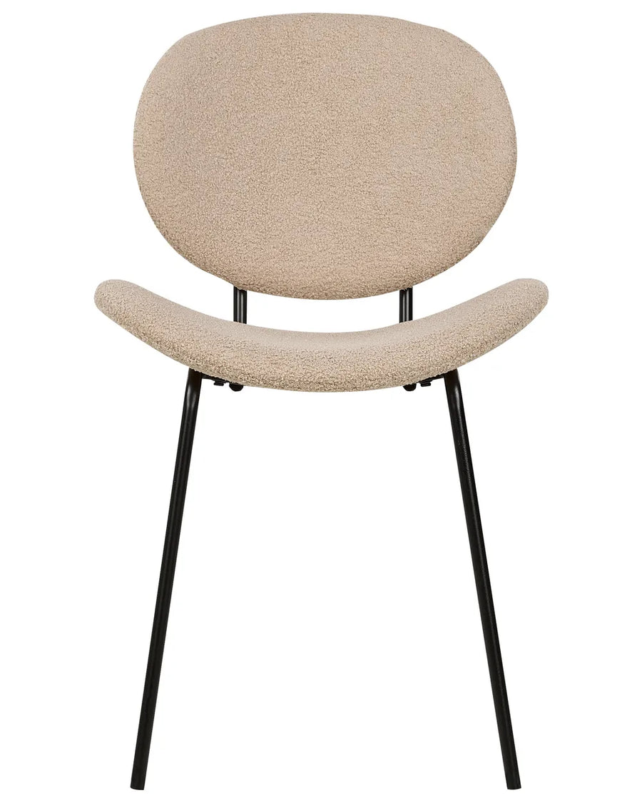 Modern accent dining chair upholstered in soft beige bouclé fabric, featuring a curved seat and rounded backrest supported by slim black metal legs.