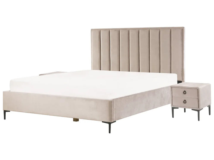 Beige upholstered bed with matching nightstand