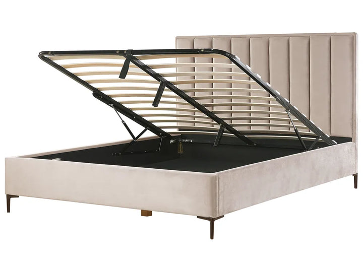 Beige upholstered bed with metal frame