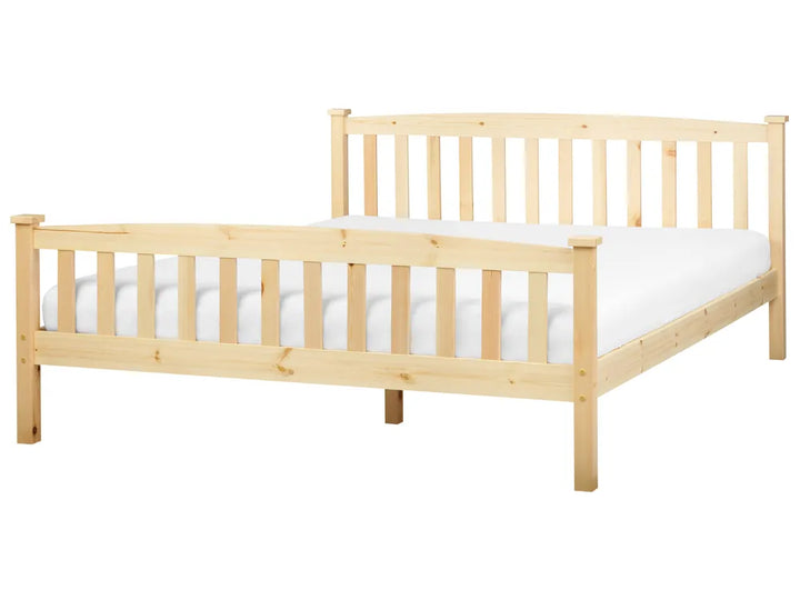 Wooden bed frame with white mattress on a white background