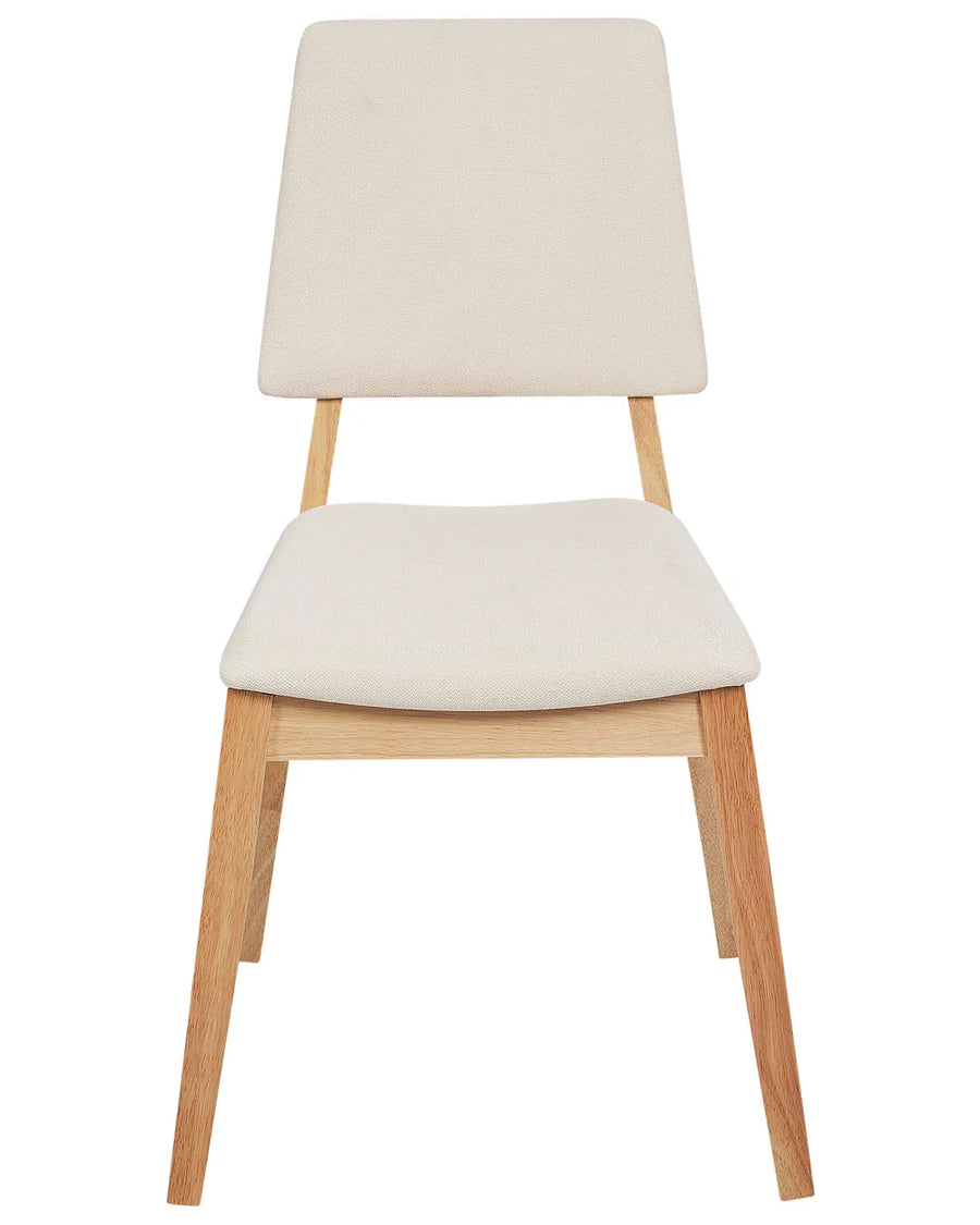 Modern upholstered dining chair with a soft cream fabric seat and backrest, paired with light wood legs for a clean, minimalist, and Scandinavian-inspired look that adds warmth and comfort to any dining space.