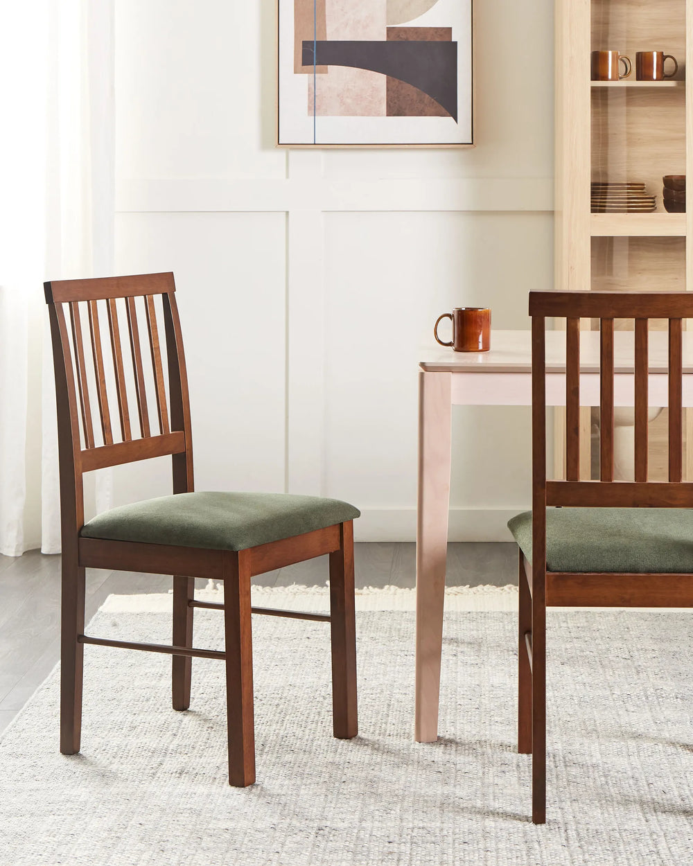 Rich wood dining chairs styled in a warm, inviting dining space with neutral décor and earthy tones, creating a cozy mid-century, rustic, and contemporary dining atmosphere.