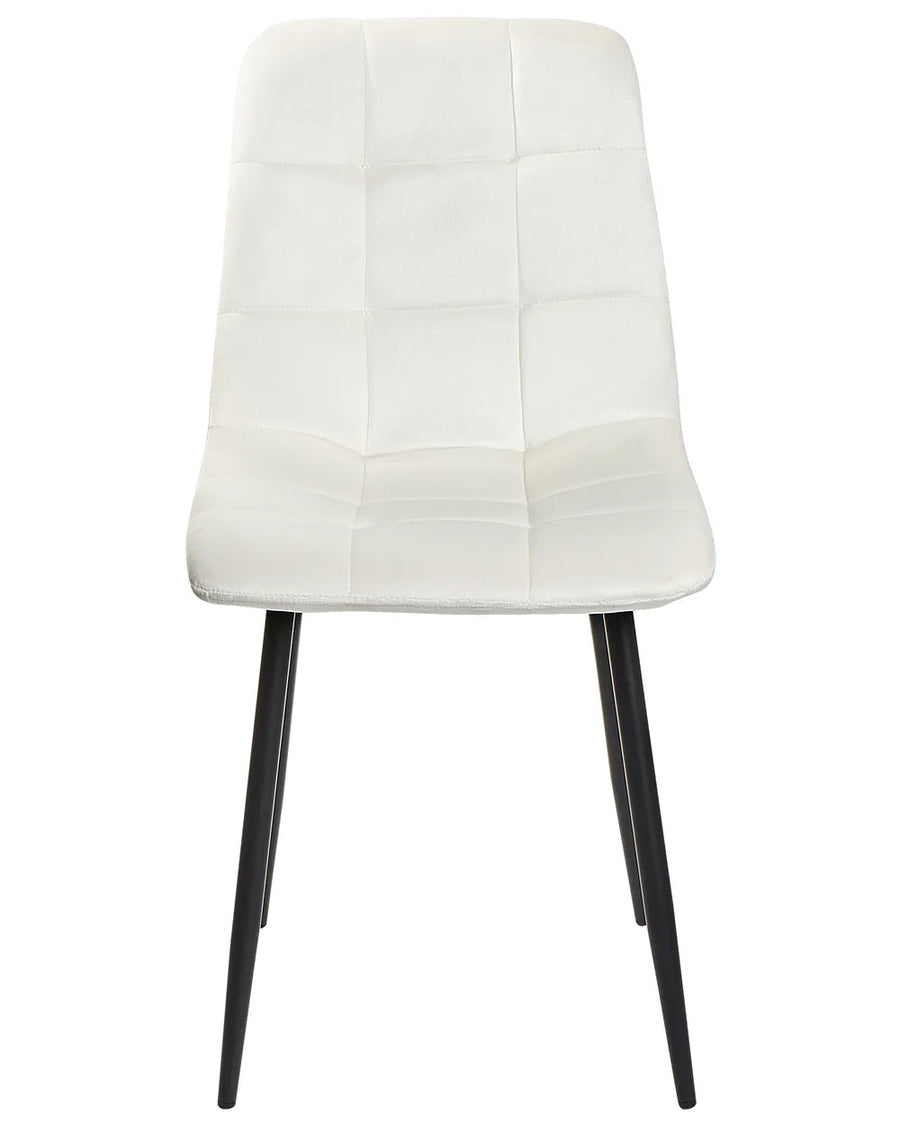 Modern dining chair featuring soft white upholstery with stitched square tufting and sleek black metal legs, offering a clean and contemporary look.