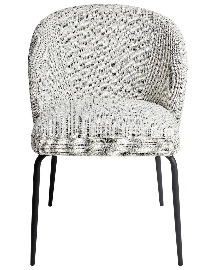 Curved accent chair upholstered in textured off-white fabric, featuring a rounded backrest, cushioned seat, and slim black metal legs.