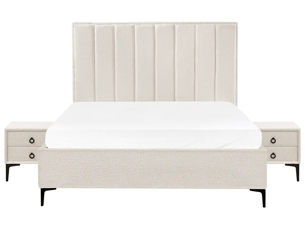 Beige upholstered bed with matching nightstands 