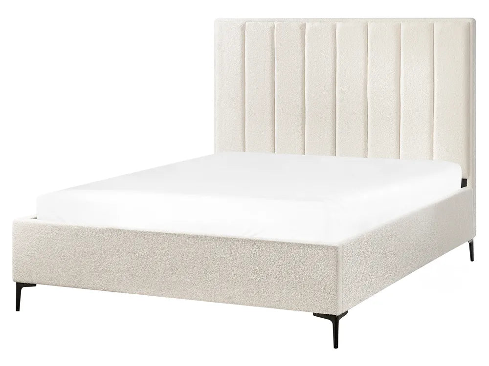 Beige upholstered bed with tufted headboard 