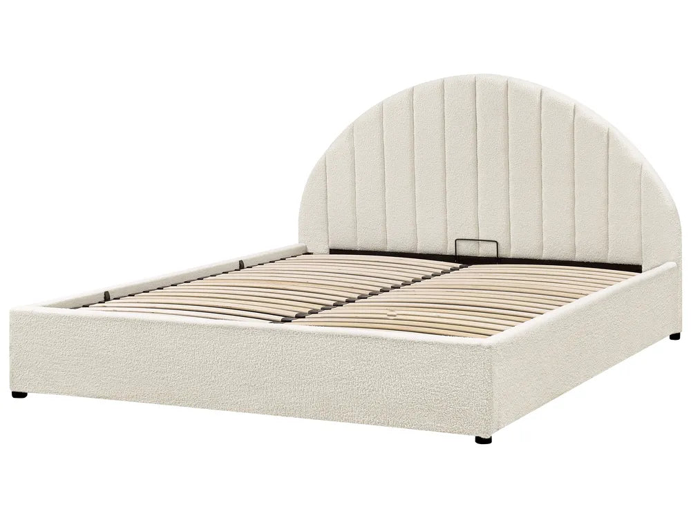 Beige upholstered bed frame on a white background