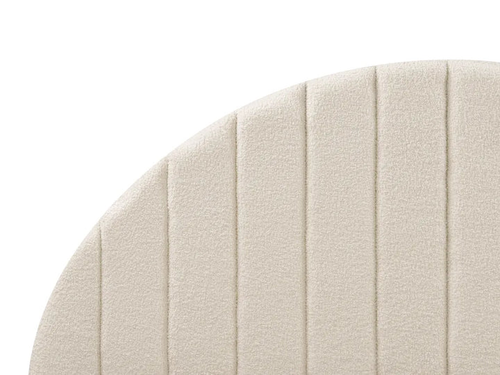 Close-up of a textured beige fabric surface