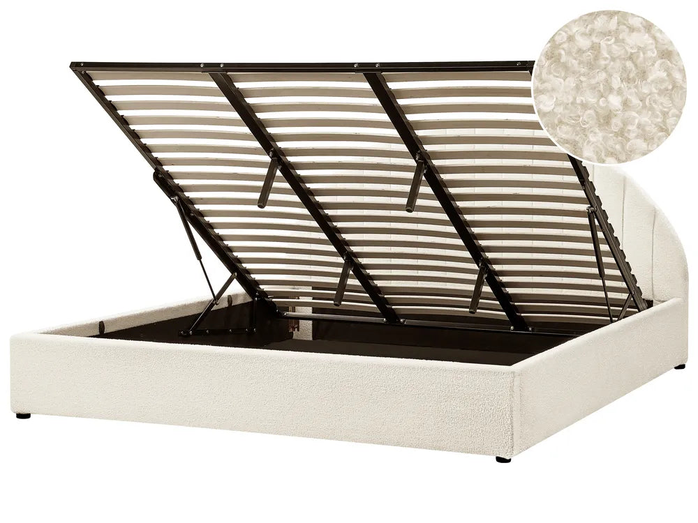 White bed frame with black metal slats on a white background