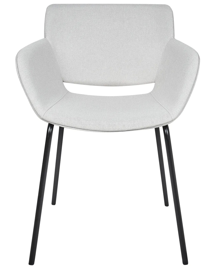 Light grey fabric dining chair with a padded seat, upholstered backrest, integrated armrests, and slim powder-coated black metal legs.