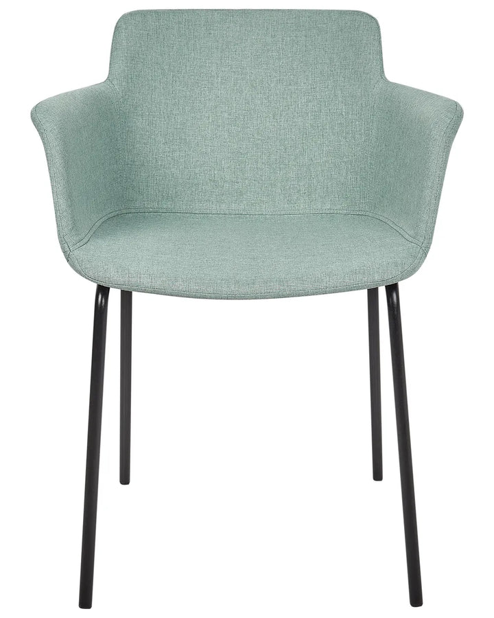 Mint green fabric dining chair with a padded seat, upholstered backrest, integrated armrests, and slim powder-coated black metal legs.