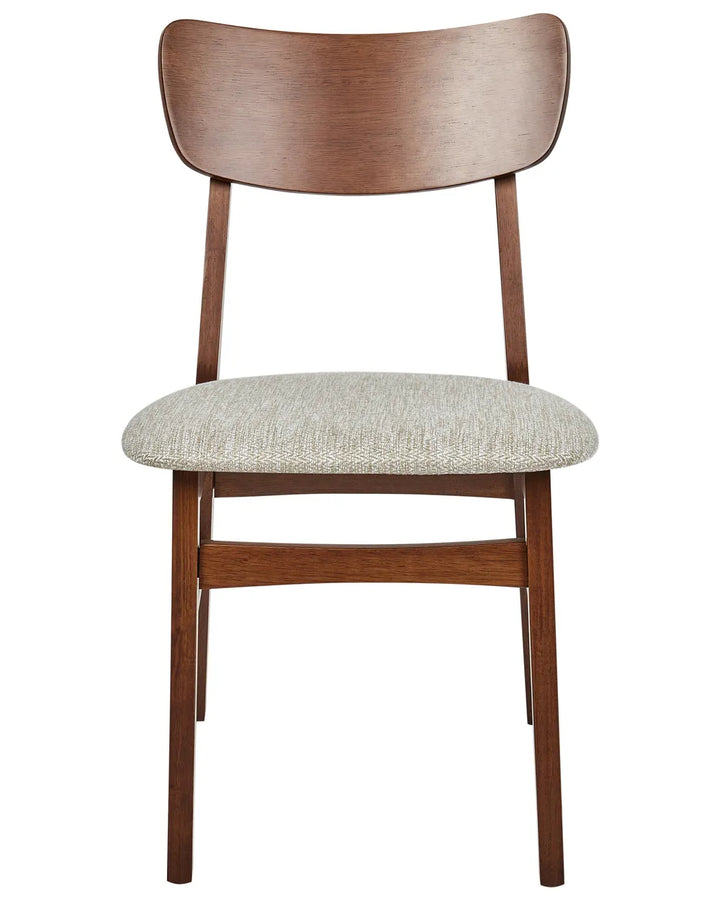 Mid-century inspired dining chair with a curved walnut-finish backrest, softly upholstered seat, and sleek tapered legs, offering a warm, refined, and timeless look for modern interiors.