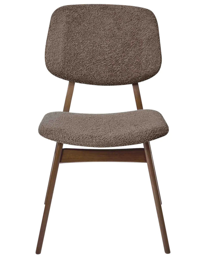 Brown bouclé dining chair with a softly curved backrest, cushioned seat, and walnut-finish wooden frame for a warm mid-century look.