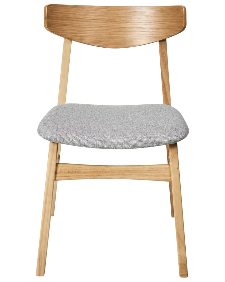 Mid-century inspired dining chair with a natural wood frame, gently curved wooden backrest, and soft light grey upholstered seat cushion, displayed on a clean neutral background.