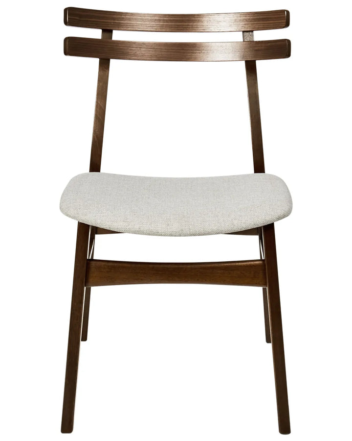 Mid-century inspired dining chair with a rich dark wood frame, double-slat curved backrest, and softly upholstered seat. The sleek silhouette combines everyday comfort with timeless Scandinavian elegance.