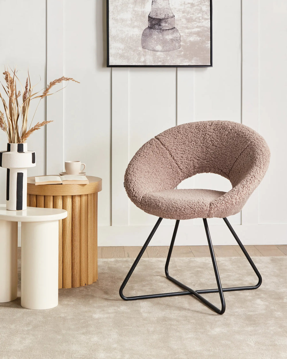 Taupe dining chairs with backrests and meta legs arranged around a dining table.