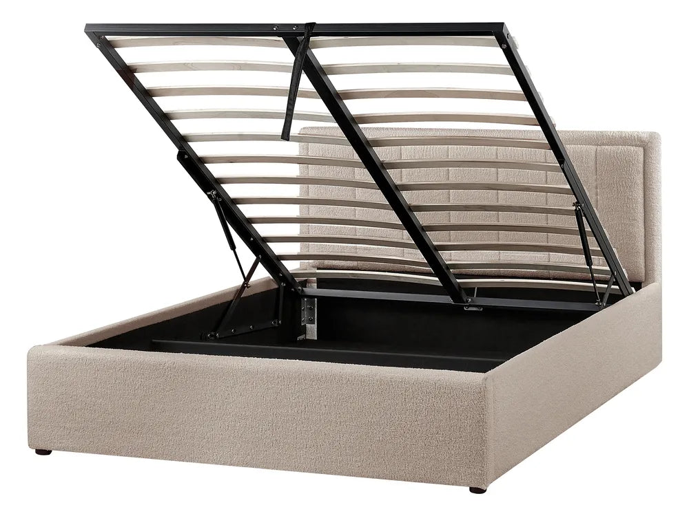Beige upholstered bed frame with black metal slat support 