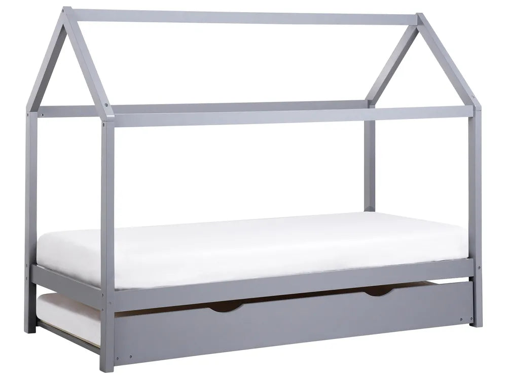Gray children's bed with a white mattress on a white background
