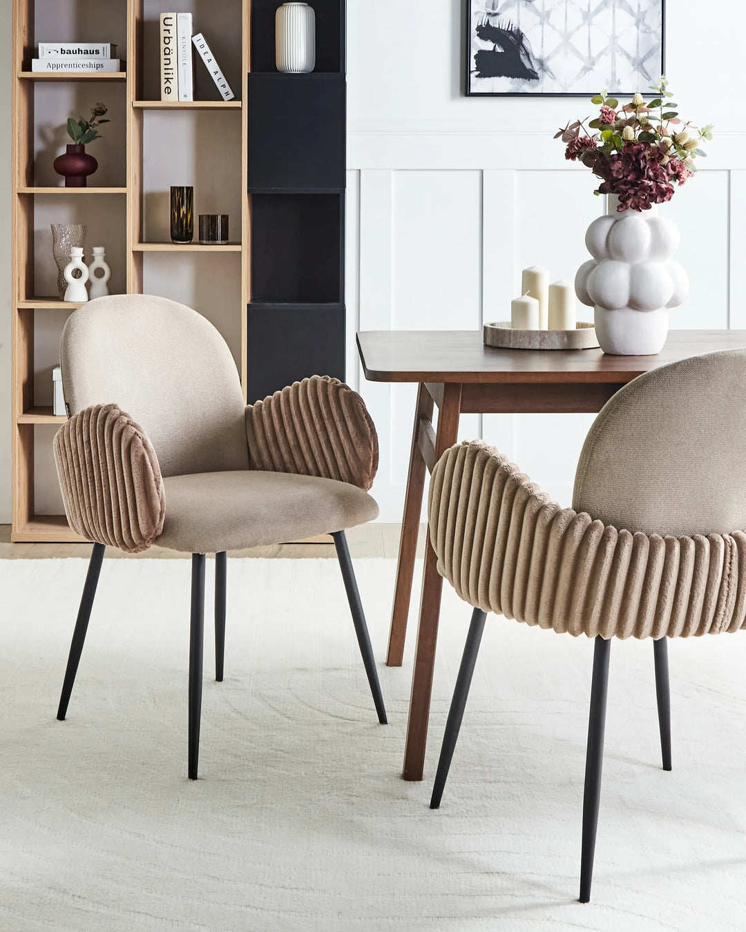 Modern office-style dining space featuring comfortable upholstered chairs with a sleek, contemporary design.