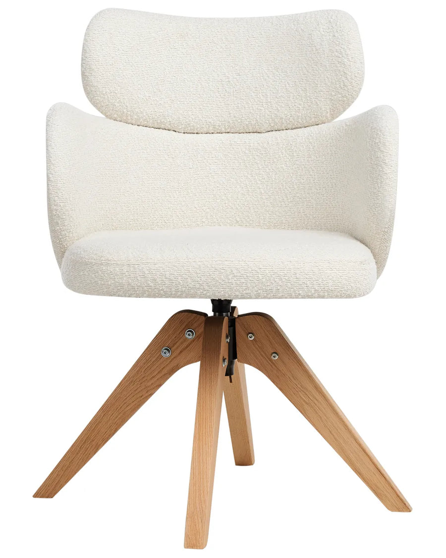 Cream bouclé swivel dining chair with a curved silhouette, supportive backrest, and natural wood swivel base.