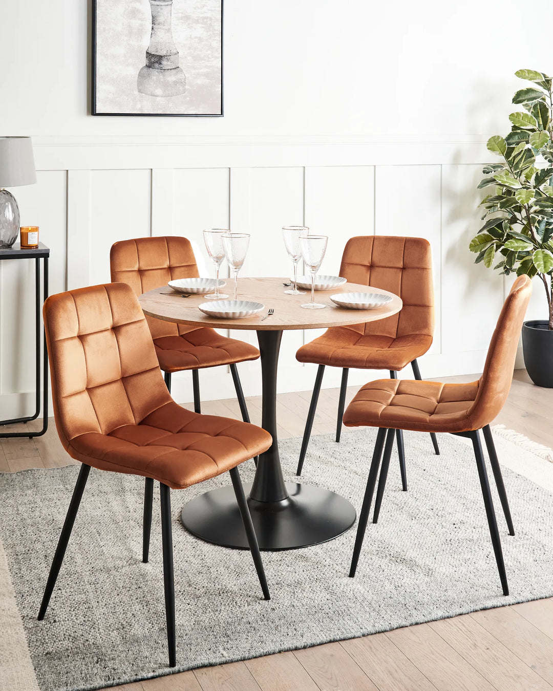 Stylish dining set featuring caramel velvet chairs that add warmth, comfort, and a modern touch to contemporary interiors.