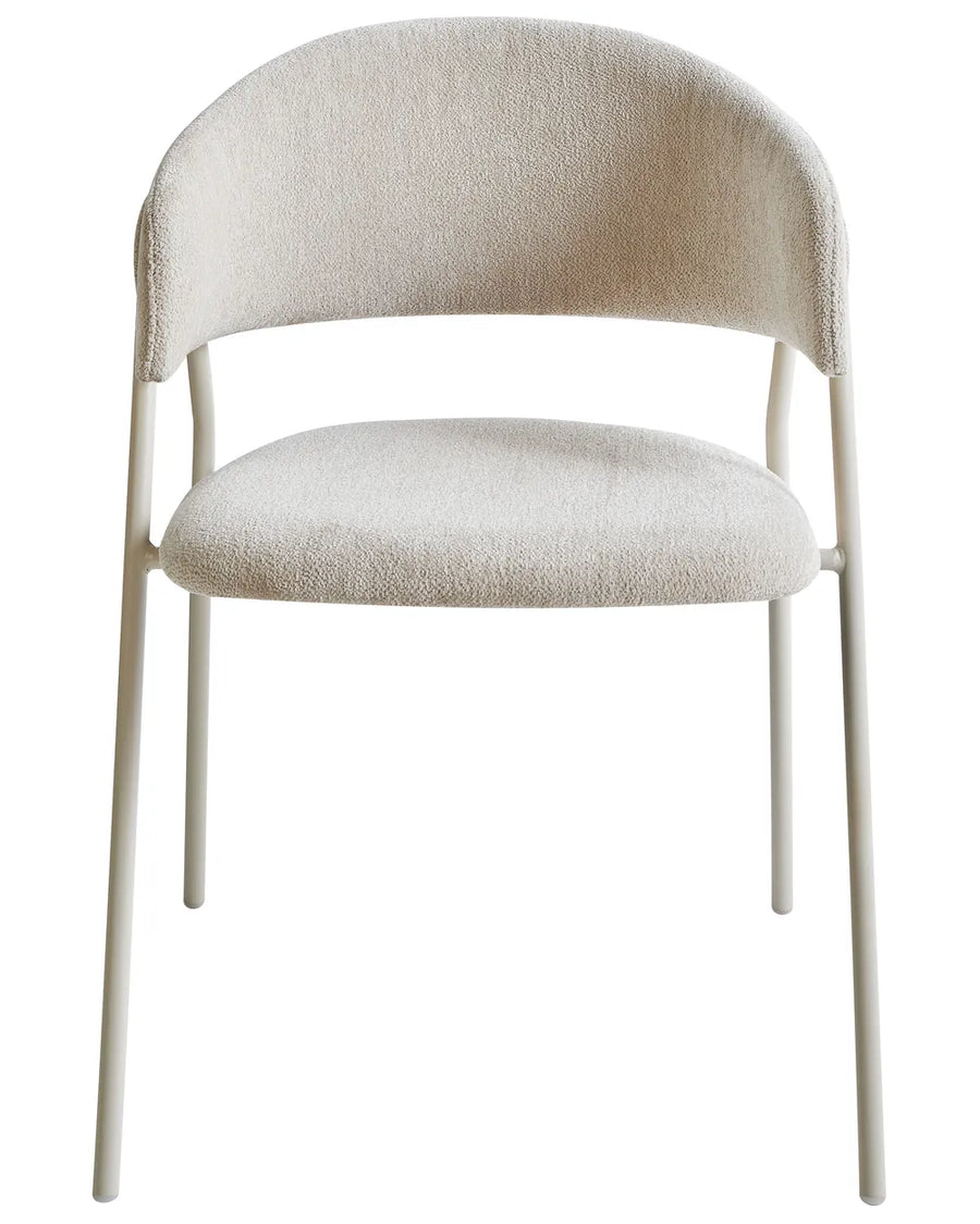 Light beige chenille dining chair with a curved upholstered backrest, padded seat, integrated armrests, and a matching powder-coated metal frame.