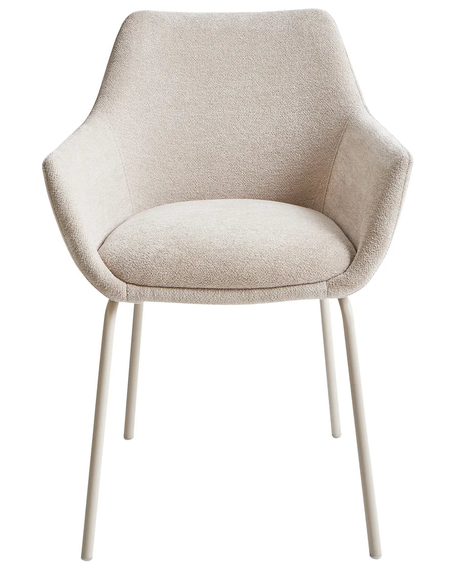 Beige boucle dining chair with armrests and beige legs.