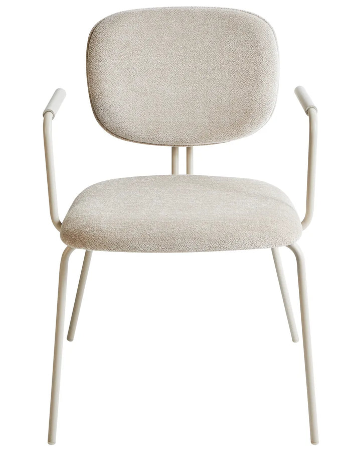 Light beige chenille dining chair with a padded seat, curved upholstered backrest, integrated armrests, and a powder-coated black metal frame.